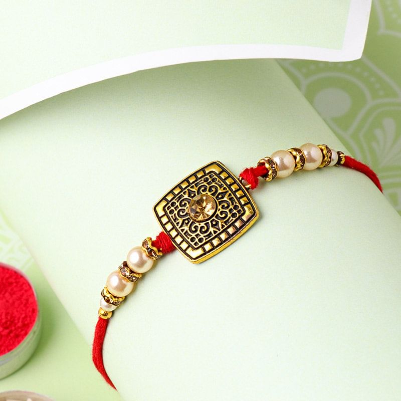 Antique Pearl Studded Rakhi