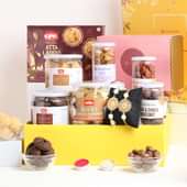 Atta Laddoo With Couple Rakhi Flavoured Nuts N Cookies