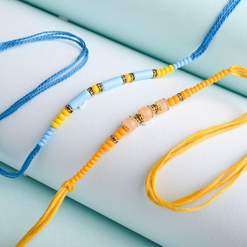 Send Designer Auspicious Beads Rakhi Online - Pearl Rakhi