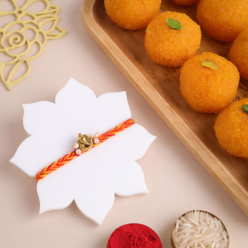 Auspicious Ganesha Mauli Rakhi With Sweets