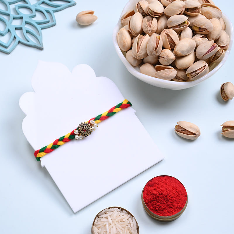 Auspicious Om Rakhi With Pistachios
