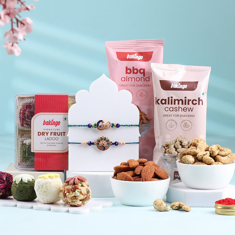 Auspicious Peacock Rakhi Duo With Nutty Treats
