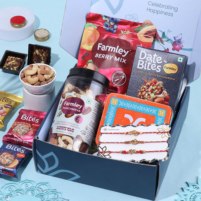 Auspicious Rakhi Trio N Gourmet Treats Hamper