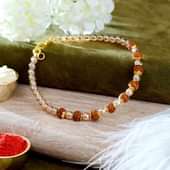 Shop Auspicious Rudraksh Pearls Bracelet Rakhi Online