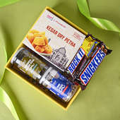 Authentic Delight Gift Hamper with Dry kesar petha, Ram ladoo, banarsi meetha paan along with some chocolates for Rakhi