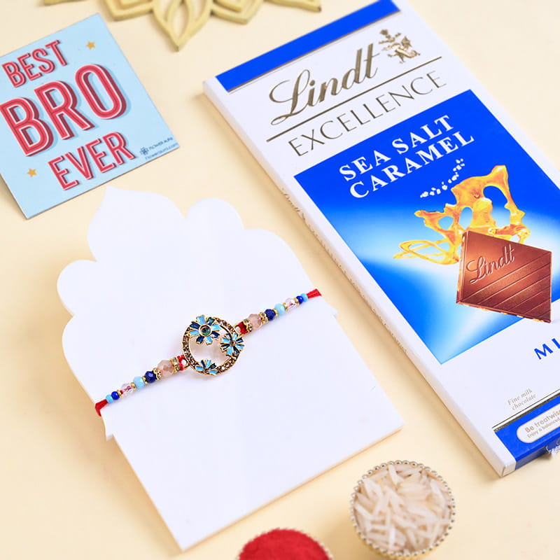 Azure Bloom Rakhi With Lindt Chocolate