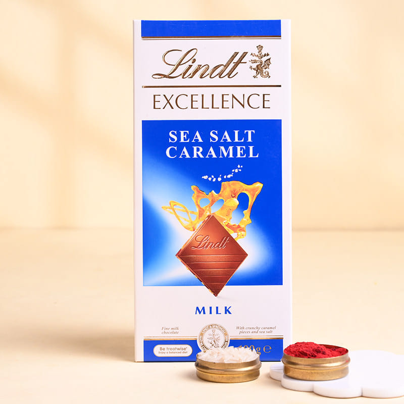 Azure Bloom Rakhi With Lindt Chocolate