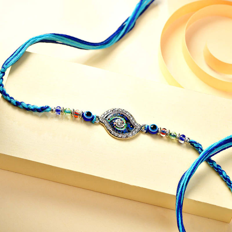 Azure Evil Eye Rakhi With Blueberry Bites