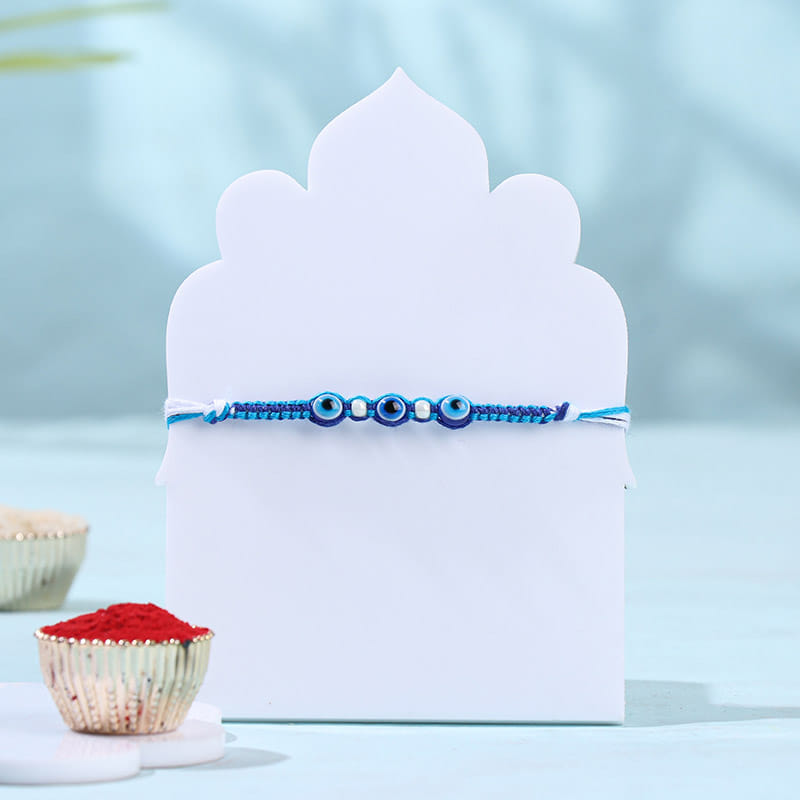 Beaded Evil Eye Rakhi With Besan Ladoos