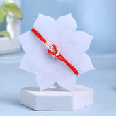 Beaded Red White Rakhi with Haldirams Rasgullas