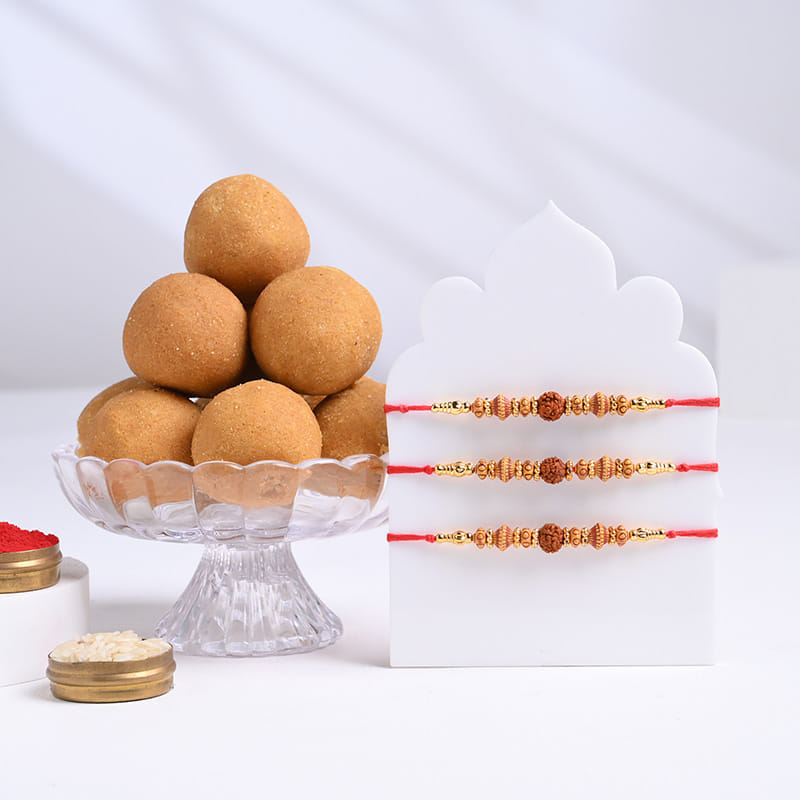 Beaded Rudraksha Rakhi Trio With Besan Ladoos