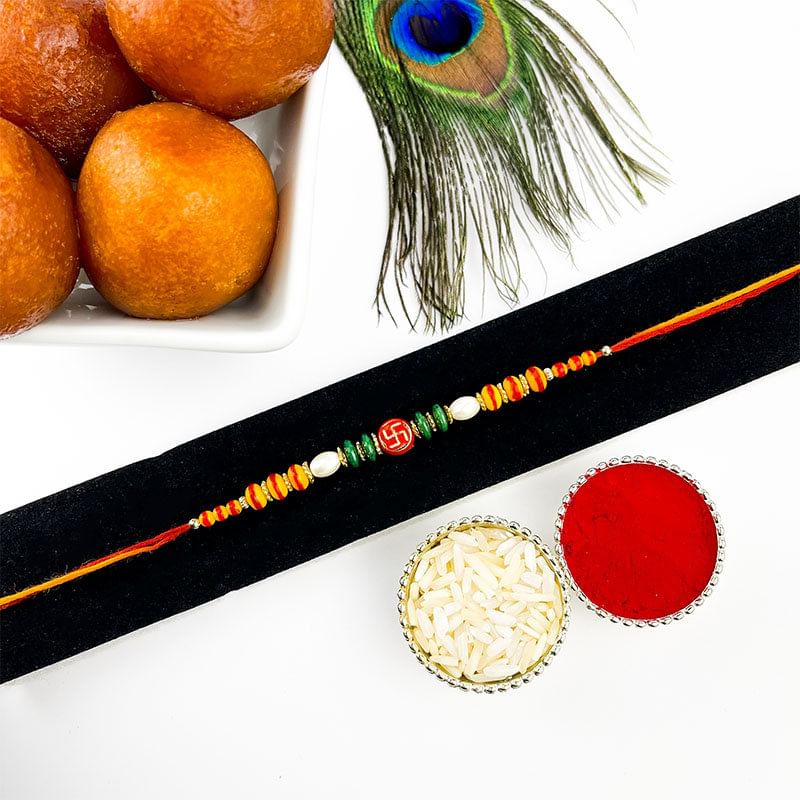 Beaded Swastika Rakhi With Gulab Jamun-Canada