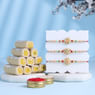Beads N Pearls Pastel Rakhi Trio With Sweets-Canada