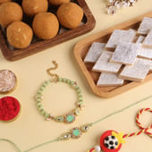 Bhaiya Bhabhi N Kid Rakhi With Sweets