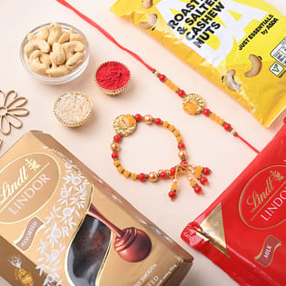 Buy Bhaiya Bhabhi Pearl Rakhi in uk with Cashews N Chocolates