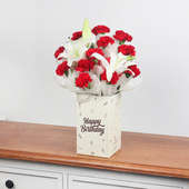 12 Red Carnations and 2 Lilies in Birthday Box
