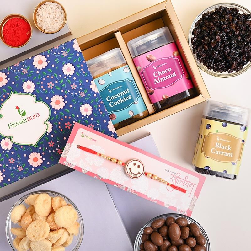 Send kids With Dry Fruits For Kids Online - Flavourful Black Current Coconut Cookies N Choco Almonds With Smiley Rakhi