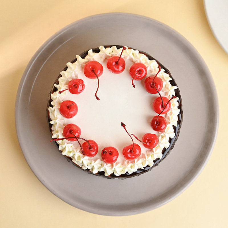 Side view of Cherry Topped Black Forest Cake