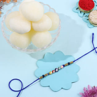 Blessed Evil Eye Rakhi With Rasgulla