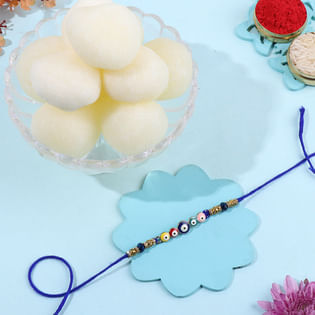 Blessed Evil Eye Rakhi With Rasgulla-Netherlands