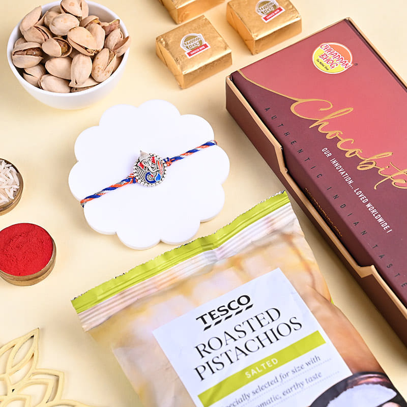 Blessed Ganesha Rakhi With Chocolate N Pistachios