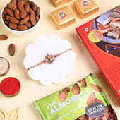 Blessed Ganesha Rakhi With Mewa Bite N Almonds