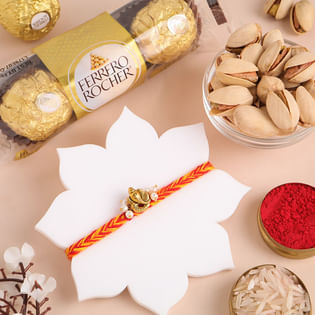Blessed Ganesha Rakhi With Sweet N Nutty Treats