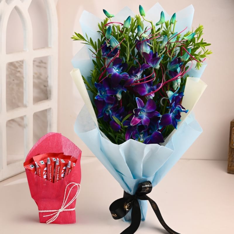 Blooming Blue Orchids With Chocolate