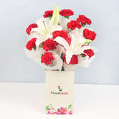 12 Red Carnations and 2 Lilies in Floweraura Box