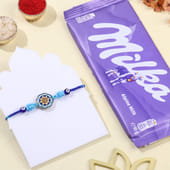 Blue Designer Rakhi With Chocolate Bar