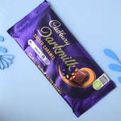 Buy Blue Evil Eye Bead Rakhi With Cadbury Dark Milk Caramel Bar