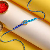 Blue Color Pearl Rakhi Online in India - Close view