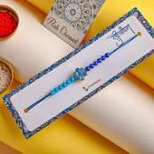 Blue Color Pearl Rakhi Online in India - Full Packed view