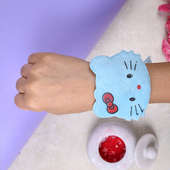 Blue Hello Kitty Rakhi - A Cartoon Rakhi on Children hand
