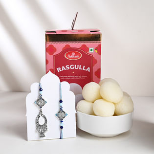 Blue N Silver Couple Rakhis With Rasgullas