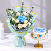 Blue and white birthday blooms with cake