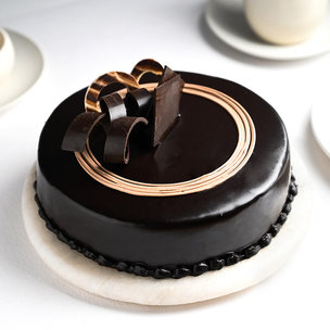 Send Chocolate Truffle Cake Online by Floweraura Bakery