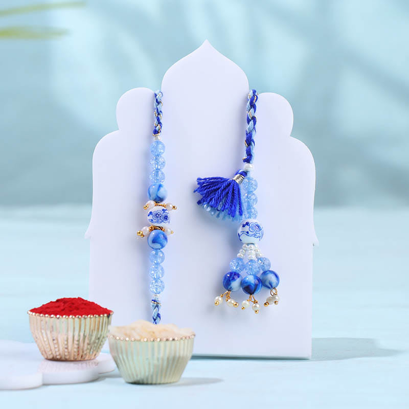 Blue Pearl Bhai Bhabhi Rakhis With Festive Treats