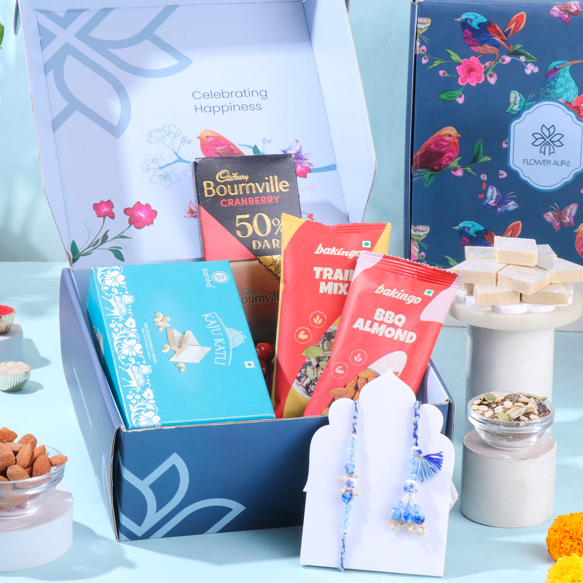 Blue Stone Bhai Bhabhi Rakhis With Gourmet Treats