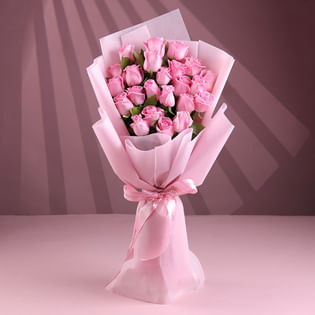 Blushing Embrace Of Pink Roses