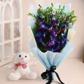 Bold Blue Orchids With Plush Teddy