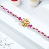 Braided Beauty Golden Floral Rakhi