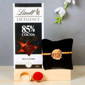 Brotherly Bonbons - One Designer Rakhi with Roli and Chawal and One Lindt Excellence Rich Dark Chocolate
