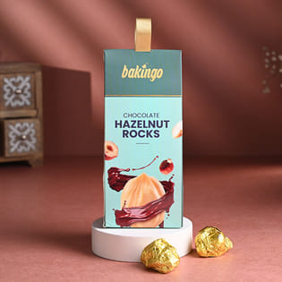 Calming Buddha Idol N Hazelnut Rocks Combo New Year Gift Hampers