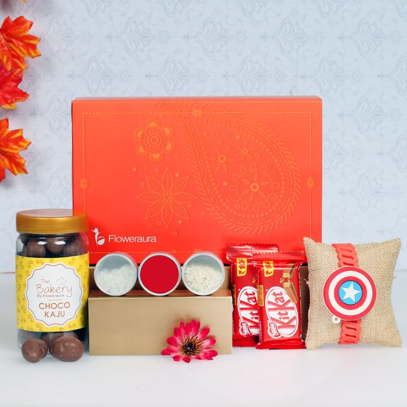 Captain America Rakhi Signature Box - One Designer Rakhi with Roli and Chawal and Choco Cashews and 2 Kitkats and One Floweraura Signature Box