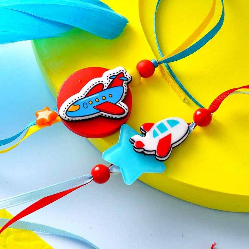 Send Cartoon Plane Rakhi & Cookie Combo to UAE