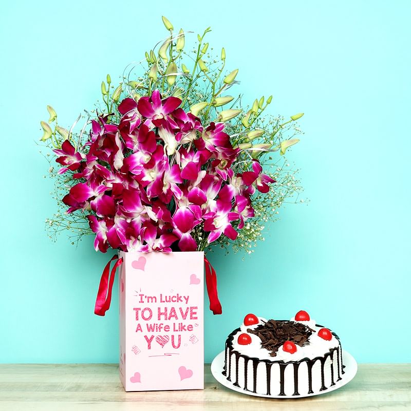 Celebrated Togetherness - Purple Orchids in Floral Box And  Blackforest Cake