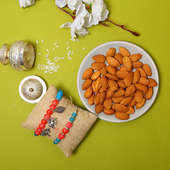 Charming Bhaiya Bhabhi Rakhi With Almonds 