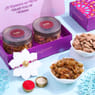 Charming Floral Rakhi With Almond Raisin Treats