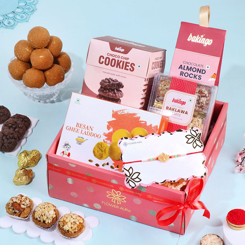 Charming Pink Rakhi With Sweets N Cookies